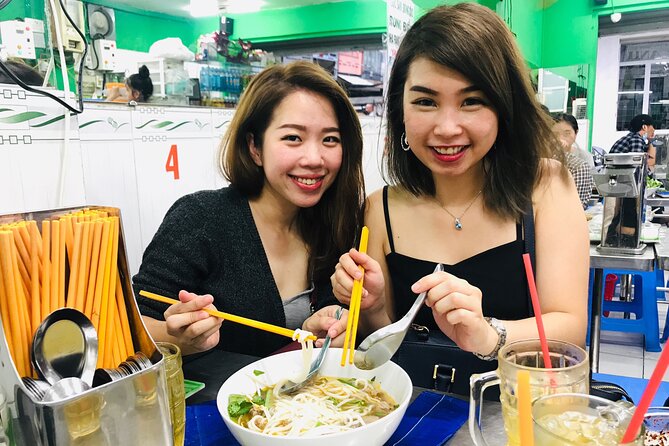 Saigon Night Scooter Experience And Local Food - Fashion streets, bridges, and the city in motion