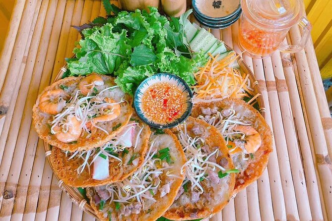 Saigon Scooter Adventure - City Sights & Street Food Tour - Nguyen Thien Thuat apartments and a serious bowl of noodles