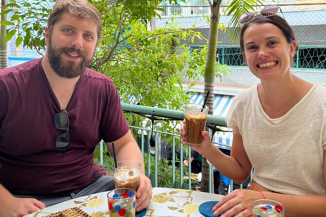 Saigon Unseen: Culture, Coffee, Hidden Spots Motorbike Adventure - Flower markets, snacks, and local drinks in District 10