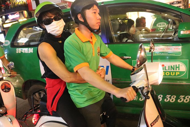 Saigon Vespa By Night Street Food Tour 4,5 Hours - Seeing Ho Chi Minh City from a moving Vespa