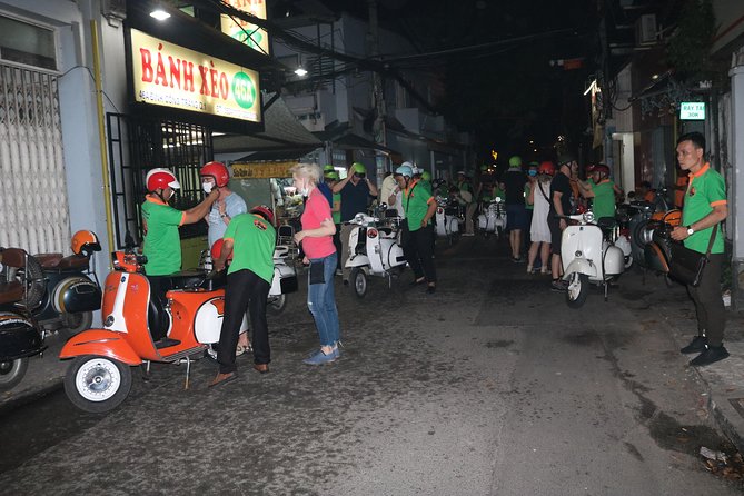 Saigon Vespa By Night Street Food Tour 4,5 Hours - Two local restaurants and a generous food program