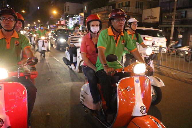Saigon Vespa By Night Street Food Tour 4,5 Hours - Ho Chi Minh Square and the first night ride