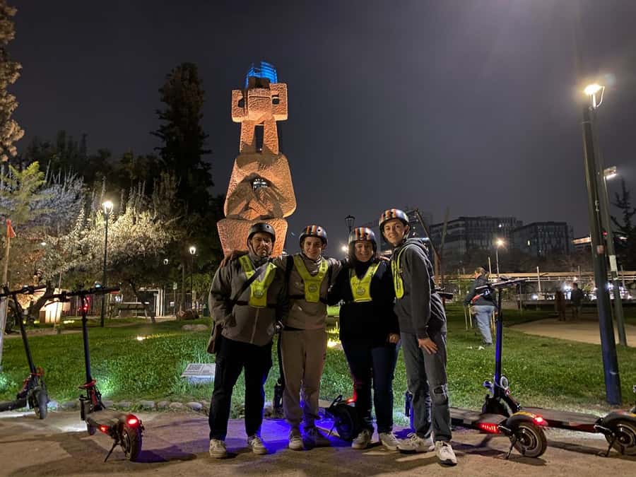 Santiago sunset tour on an electric scooter. City and nature - Meeting at Cerro San Cristóbal with the right gear