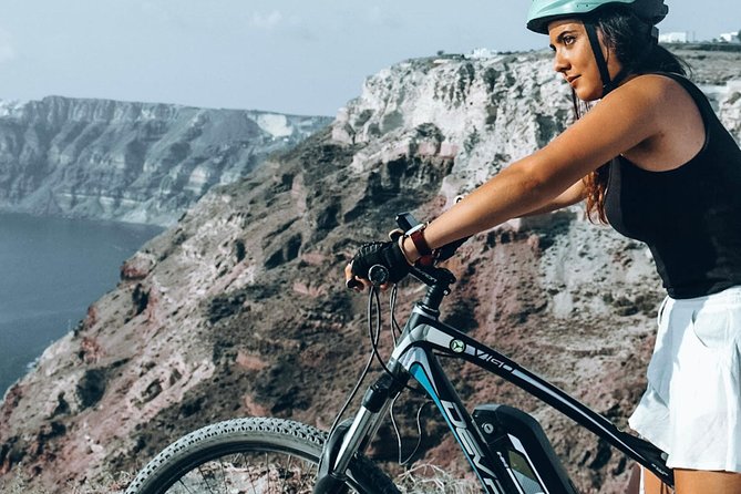 Santorini Tour on Electric Bikes & Scooters - Returning through vineyards and Emporio’s windmills