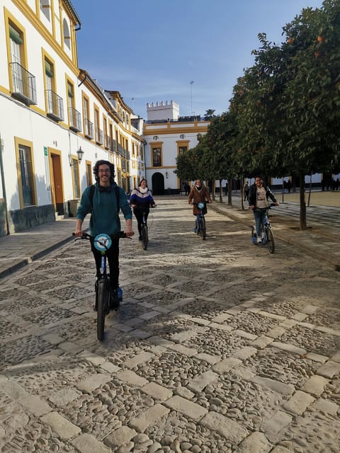 Seville: Electric Kickscooter Tour by night - Starting at the Sevilla Tourist Office