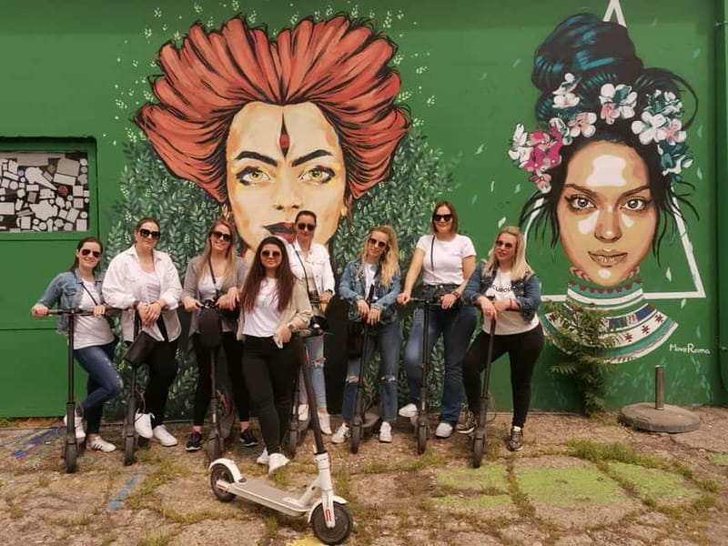 Street Art E Scooter tour - Riding through three urban neighborhoods