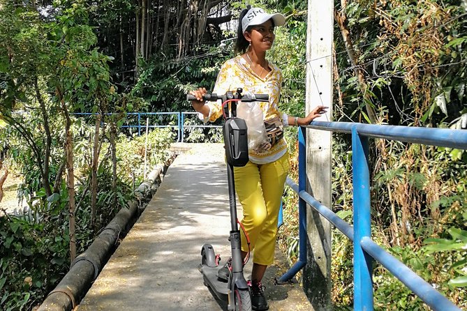 Take a E-Scooter Ride in Bangkok's Jungle - Meeting at Wat Khlong Toei Nok Pier
