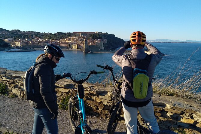 The Collioure Tops on Electric Scooters - Fort Saint Elme above Collioure