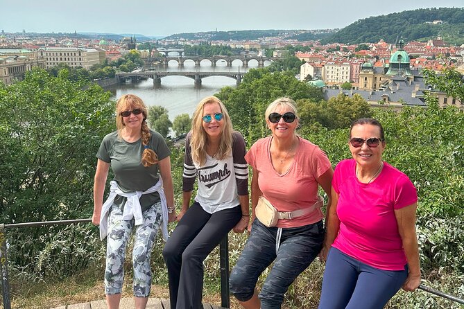 The Highlights of Prague on eBike or electric Scooter - National Theater views and the Charles Bridge