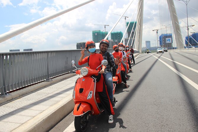 The Insider's Saigon With Female Ao Dai Riders Vespa 4,5 Hours - Why a Vespa is a smart way to see Saigon