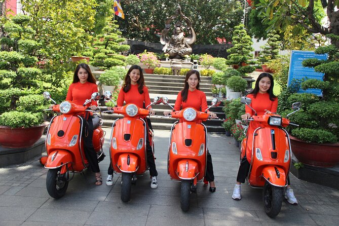 The Insider's Saigon With Female Ao Dai Riders Vespa 4,5 Hours - Cholon, Binh Tay Market, and Thien Hau Pagoda