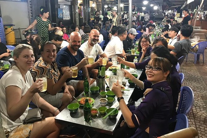 The Unique Ao Dai Street Food Tour By Scooter - Ho Thi Ky Flower Market brings color between meals