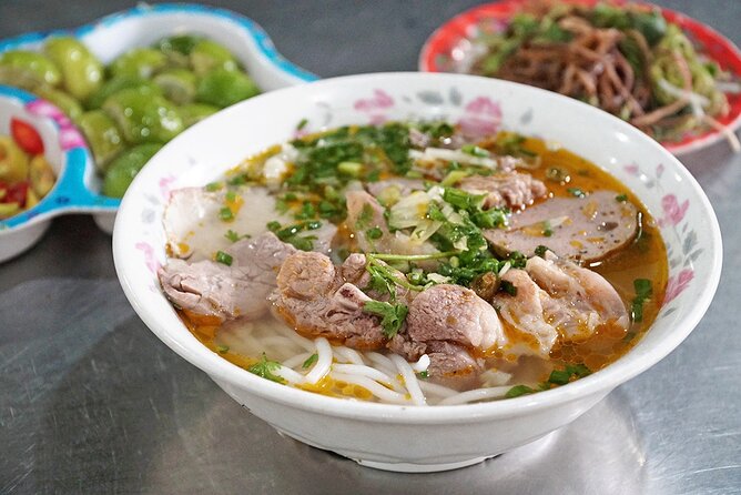 The Unique Ao Dai Street Food Tour By Scooter - Scooter comfort, traffic, and practical limits