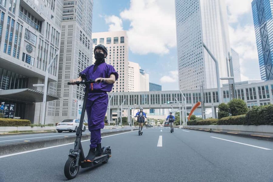 Tokyo: Ninja E-Scooter Tour with English Speaking Guide - Meeting under the Godzilla Head