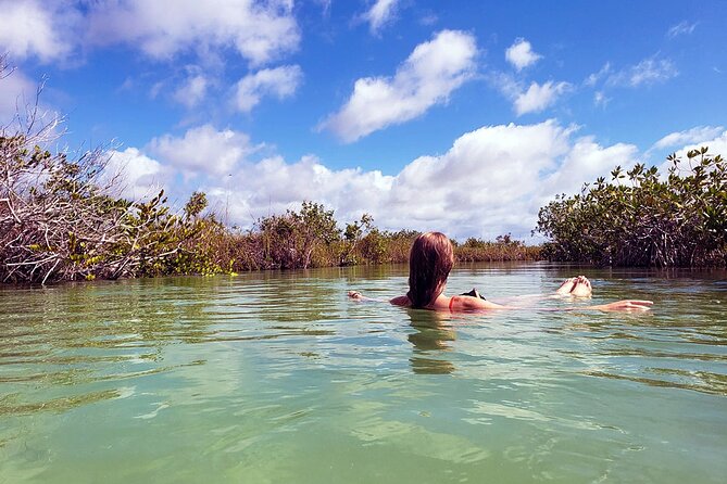 Tulum Guided Scooter Tour, Muyil Ruins, Boat Eco, Float Down Mayan Canals Lunch - Riding to Sian Ka’an by scooter, ATV, or e-bike