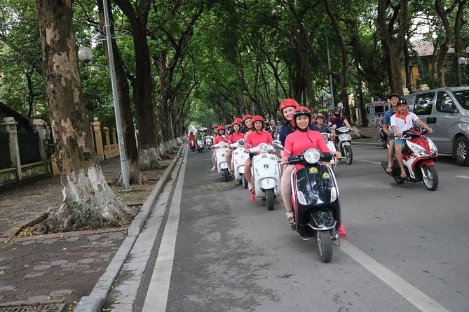 Vespa City Tour &Train Street Female With Ao Dai Riders 4,5 Hours - Seeing Hanoi from the back of a Vespa