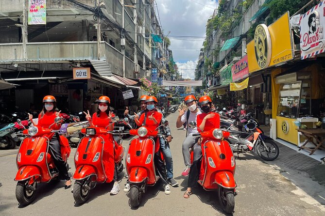 Vespa Female Ao Dai riders Night Street Food + See Train Street - 6:00 p.m. pickup in the Old Quarter