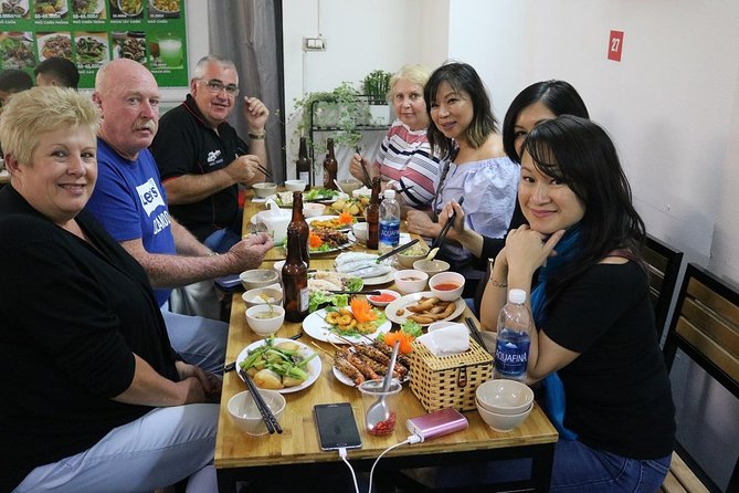 Vespa Saigon By Night Street Food Tour - Vietnamese pancakes and spring rolls at the first food stop