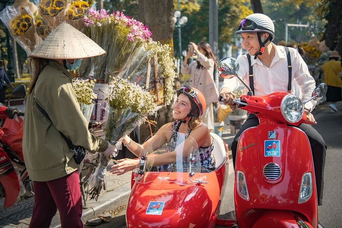 Vespa Sidecar Sightseeing and Cuisine Tour in Hanoi - The Old City Gate and modern life among old buildings