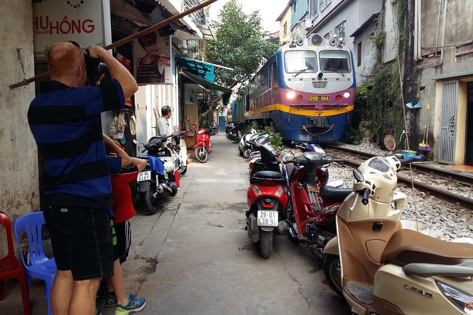 Vespa Tour Hanoi Life Rustic - West Lake, a local pagoda, and a drink outdoors