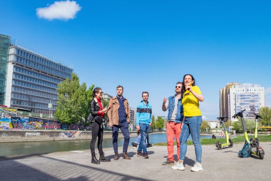 Vienna: Guided Tour by Kick Bike or E-Scooter with a Local - Danube Island and a more local pace